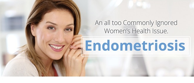 woman smiling at desk